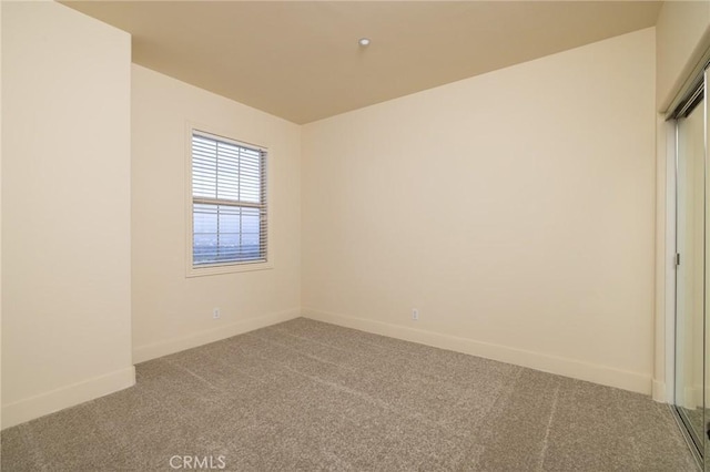 view of carpeted spare room