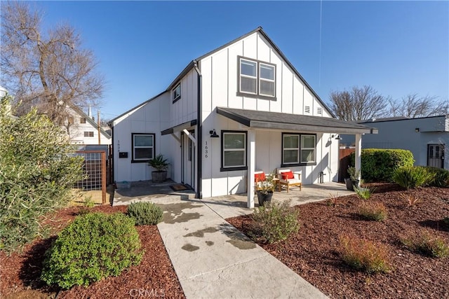 view of front of house with a patio area and covered porch