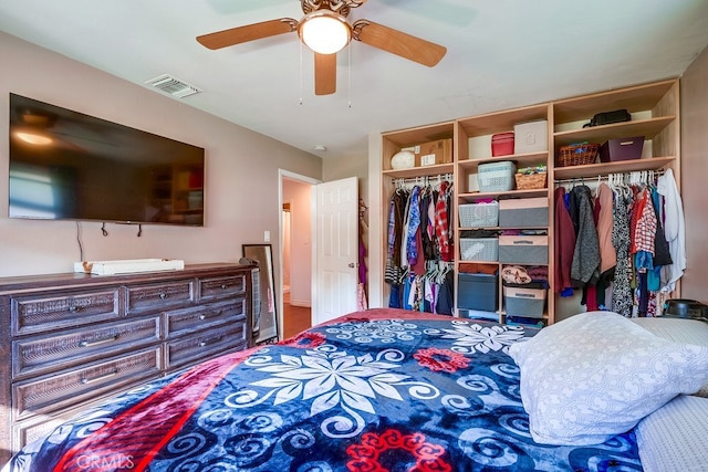 bedroom with visible vents and a ceiling fan