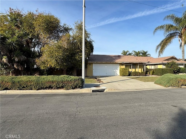 view of front of house with driveway and an attached garage