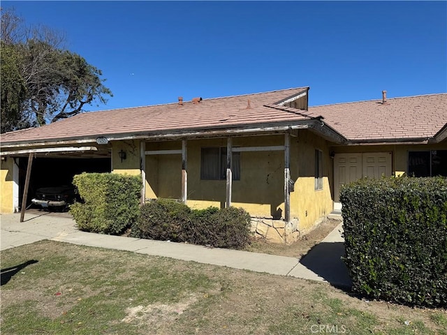 view of property exterior with stucco siding