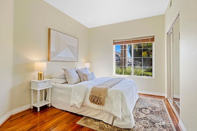 bedroom featuring wood-type flooring