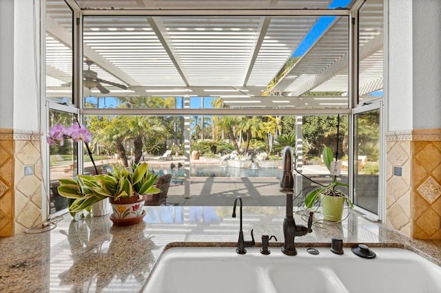 sunroom / solarium with sink