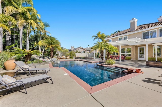 view of pool with a pergola and a patio