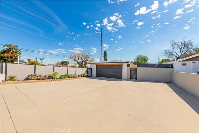 garage with fence