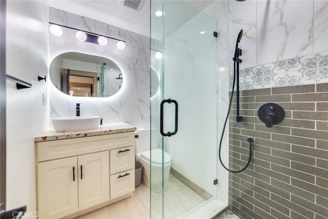 5058 Rose Ave, Riverside, CA 92505 - full bathroom with tile walls, vanity, visible vents, and a stall shower