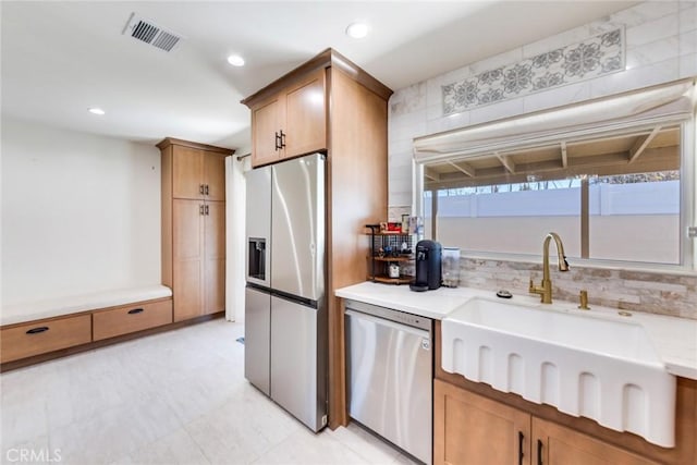 5058 Rose Ave, Riverside, CA 92505 - kitchen featuring recessed lighting, stainless steel appliances, visible vents, and a sink