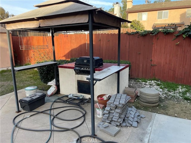 view of patio featuring a gazebo