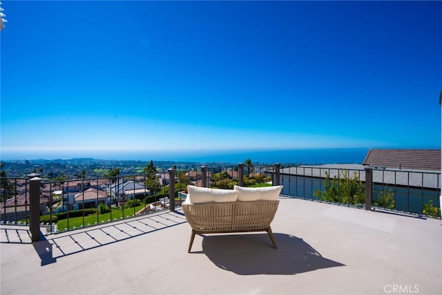 view of patio featuring a water view