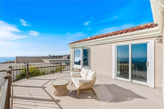 view of patio / terrace with a balcony