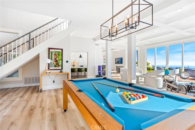 playroom with pool table, coffered ceiling, wood finished floors, visible vents, and beam ceiling