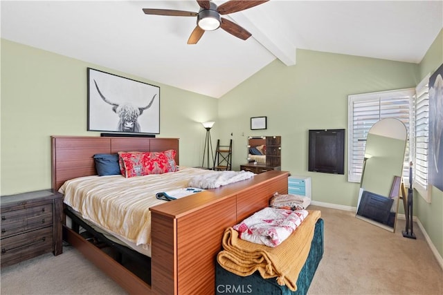 carpeted bedroom with vaulted ceiling with beams, baseboards, and a ceiling fan