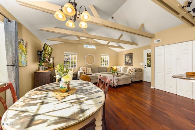 dining area featuring lofted ceiling with beams, visible vents, a chandelier, and dark wood-style flooring