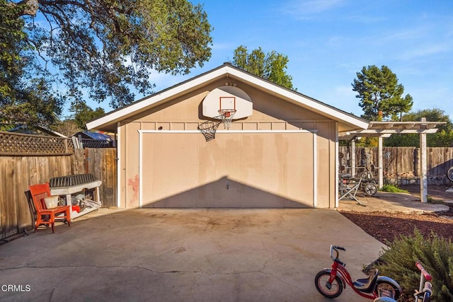 garage with fence