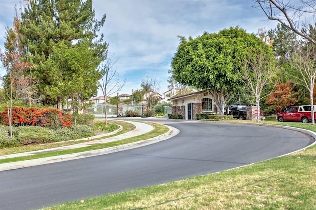 view of road featuring curbs and sidewalks