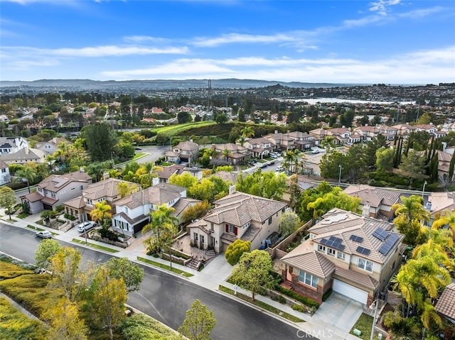 birds eye view of property with a residential view