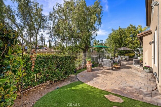 view of patio / terrace featuring outdoor dining space and fence private yard