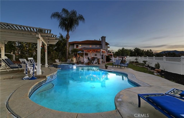 pool at dusk featuring a fenced backyard, a patio, and a pergola