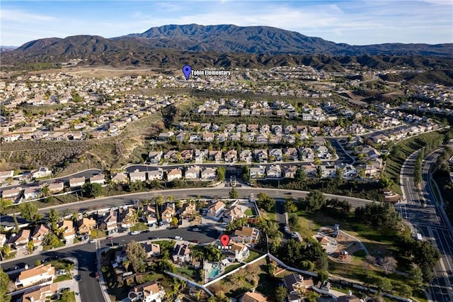 bird's eye view featuring a residential view and a mountain view