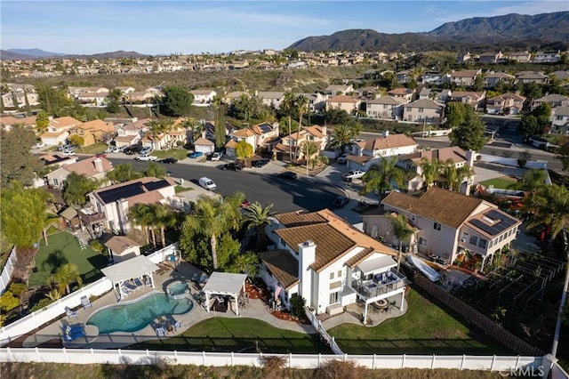 drone / aerial view with a mountain view and a residential view