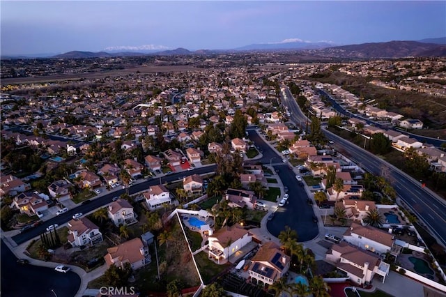 bird's eye view featuring a residential view and a mountain view