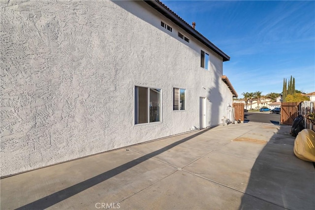 view of home's exterior featuring a patio and stucco siding