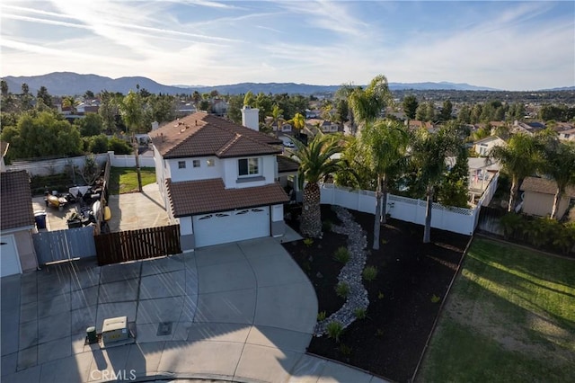 drone / aerial view with a residential view and a mountain view