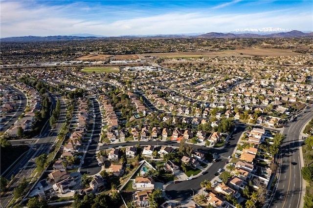 birds eye view of property with a residential view and a mountain view