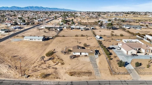 drone / aerial view featuring a mountain view