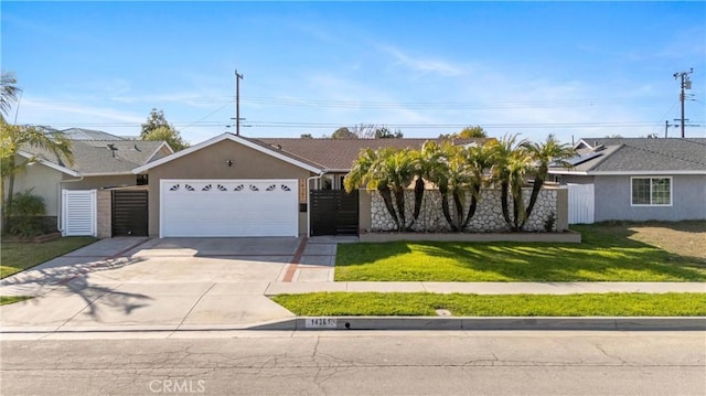 ranch-style home with a front yard, fence, driveway, an attached garage, and stucco siding