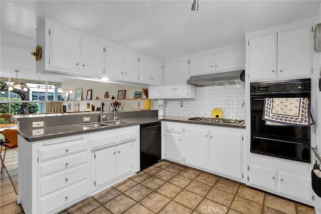 kitchen featuring wall chimney exhaust hood, sink, stainless steel gas cooktop, kitchen peninsula, and dishwasher