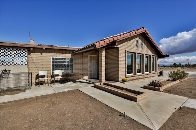 rear view of house with a patio area