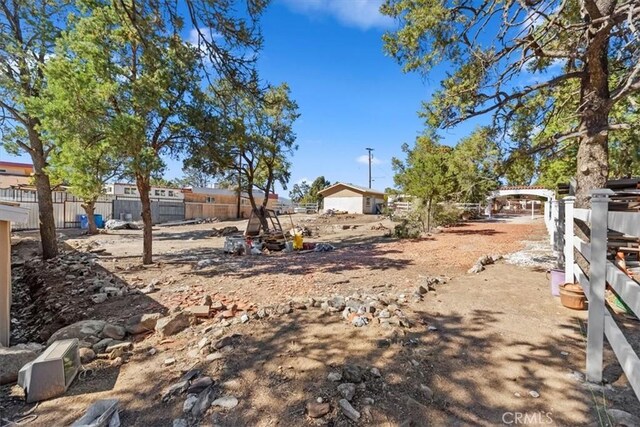 view of yard featuring fence