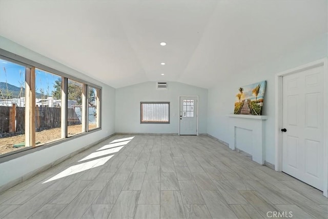 69719 Palm Springs Ave, Mountain Center, CA 92561 - unfurnished living room with lofted ceiling and visible vents