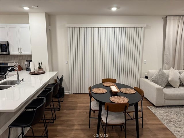3620 S Allston Paseo Unit 7, Ontario, CA 91761 - dining area featuring dark wood-style flooring and recessed lighting