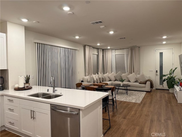 3620 S Allston Paseo Unit 7, Ontario, CA 91761 - kitchen with a sink, dishwasher, dark wood finished floors, open floor plan, and visible vents