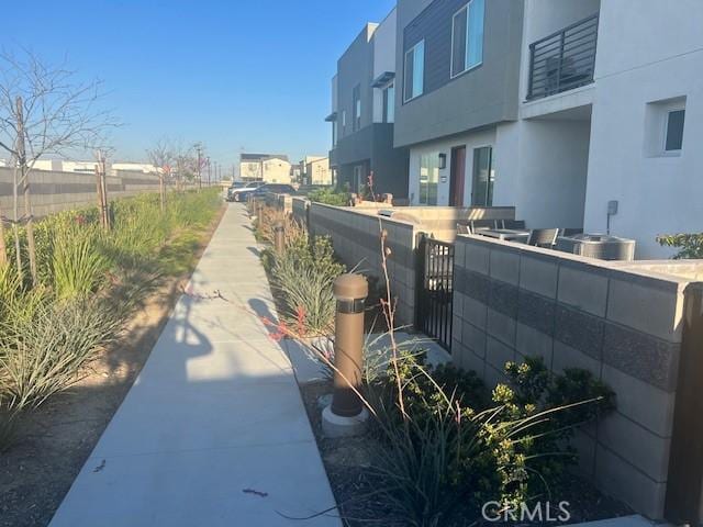 3620 S Allston Paseo Unit 7, Ontario, CA 91761 - view of property's community with a residential view and fence