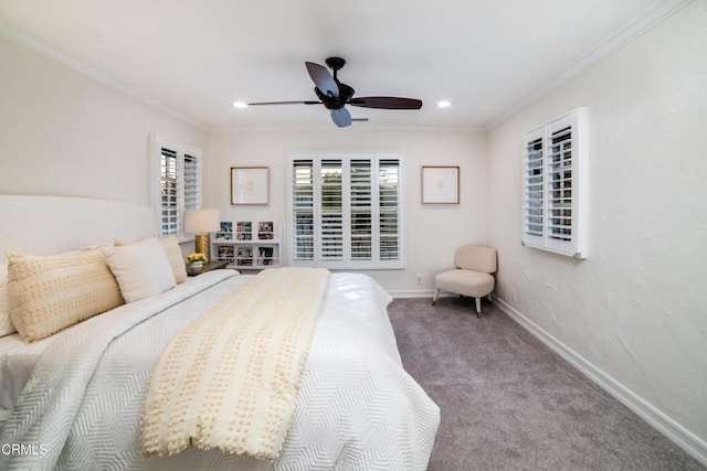 carpeted bedroom featuring ceiling fan and crown molding