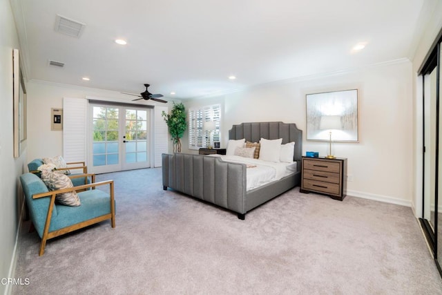 carpeted bedroom featuring ceiling fan, access to outside, crown molding, and french doors