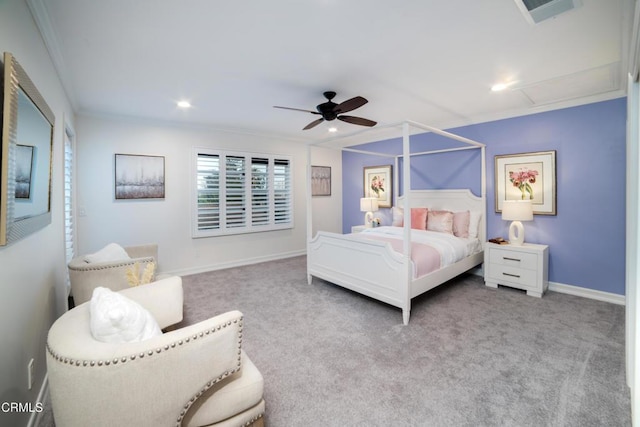 carpeted bedroom with ornamental molding and ceiling fan