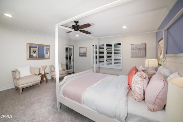 bedroom with carpet floors, crown molding, and ceiling fan