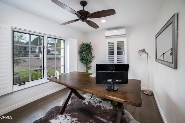 home office with an AC wall unit, ceiling fan, and dark hardwood / wood-style floors