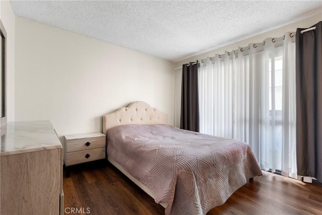 420 W Windsor Rd, Glendale, CA 91204 - bedroom with dark wood-style floors and a textured ceiling