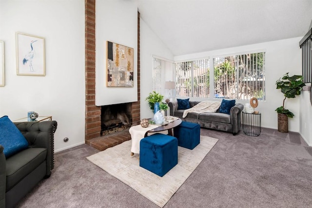 living room with carpet floors, lofted ceiling, a fireplace, and baseboards