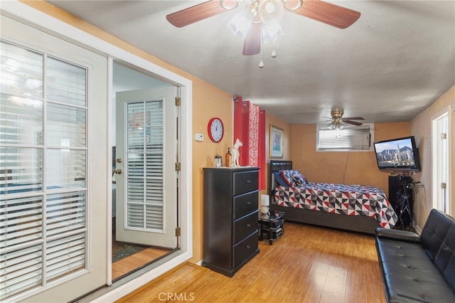 bedroom featuring ceiling fan and hardwood / wood-style floors