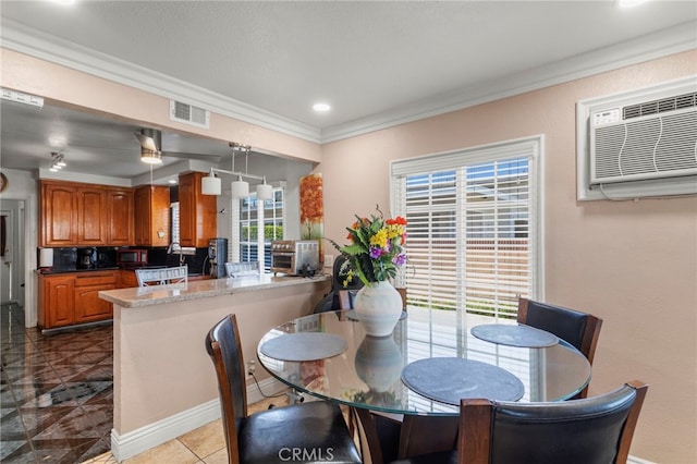 tiled dining space featuring a wall unit AC, recessed lighting, visible vents, and ornamental molding