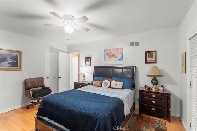 bedroom featuring wood-type flooring and ceiling fan