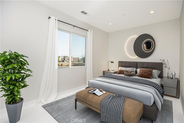 bedroom with recessed lighting and visible vents