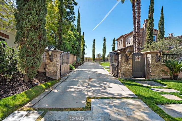 view of road featuring a gate