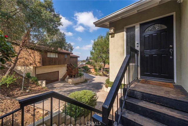 property entrance featuring stucco siding